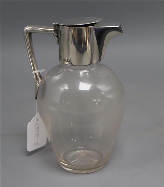 A late Victorian silver mounted glass claret jug by Hukin & Heath, London, 1898, height 19.6cm.